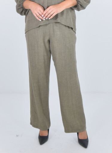 Άνετη μονόχρωμη παντελόνα με γύρω γύρω λάστιχο Άνετη μονόχρωμη παντελόνα με γύρω γύρω λάστιχο