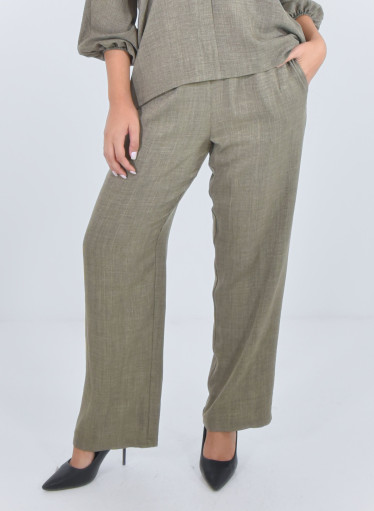 Άνετη μονόχρωμη παντελόνα με γύρω γύρω λάστιχο Άνετη μονόχρωμη παντελόνα με γύρω γύρω λάστιχο