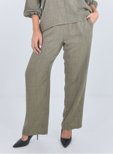 Άνετη μονόχρωμη παντελόνα με γύρω γύρω λάστιχο Άνετη μονόχρωμη παντελόνα με γύρω γύρω λάστιχο