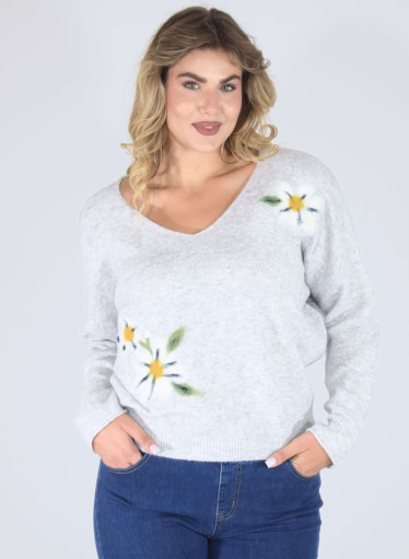 Μονόχρωμη μπλούζα με φλοράλ λεπτομέρειες  Μονόχρωμη μπλούζα με φλοράλ λεπτομέρειες