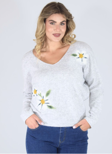 Μονόχρωμη μπλούζα με φλοράλ λεπτομέρειες  Μονόχρωμη μπλούζα με φλοράλ λεπτομέρειες