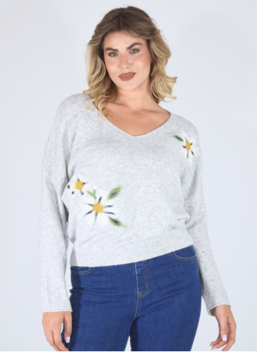 Μονόχρωμη μπλούζα με φλοράλ λεπτομέρειες  Μονόχρωμη μπλούζα με φλοράλ λεπτομέρειες