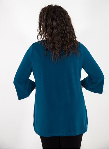 Ασύμμετρη μονόχρωμη μπλούζα