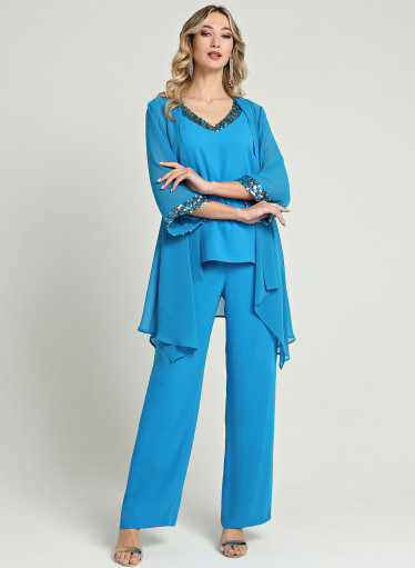 Κομψό σετ με παγιέτες τοπ και τουνίκ Κομψό σετ με παγιέτες τοπ και τουνίκ